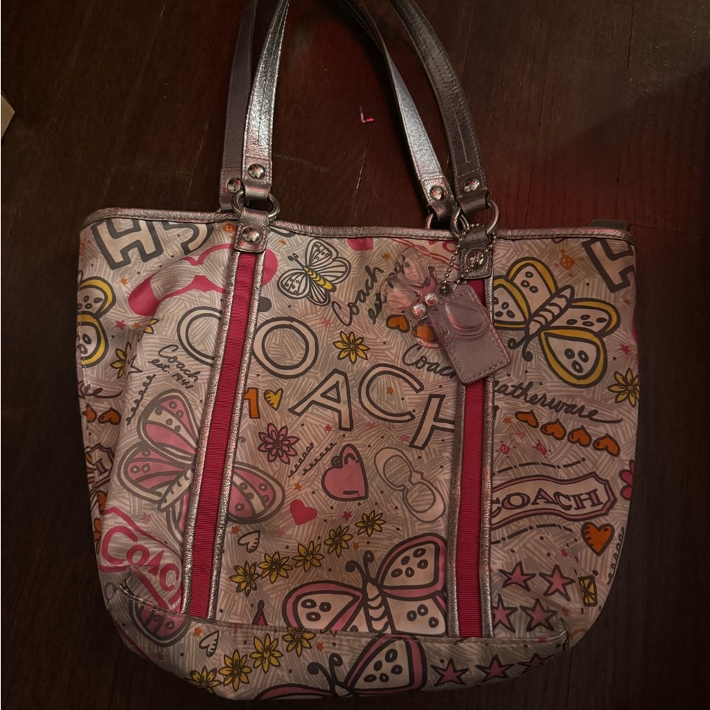 Pink butterfly coach purse